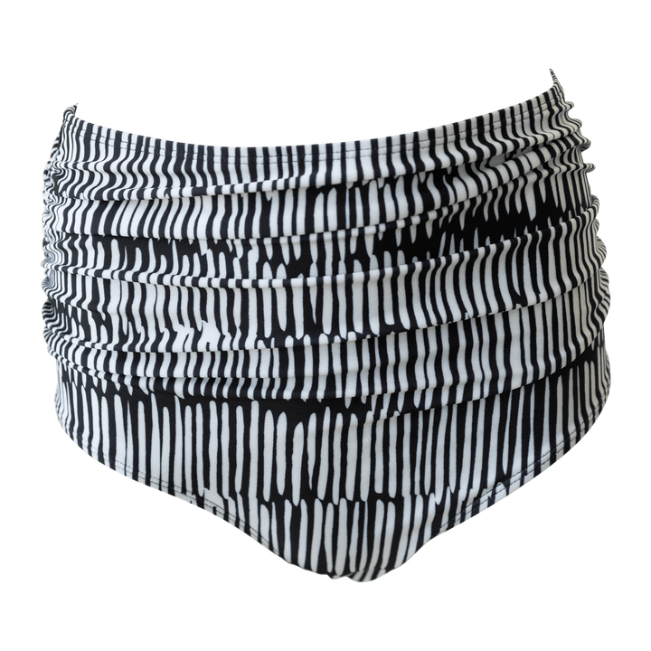 Flat lay image of black and white patterned swimsuit bottoms.